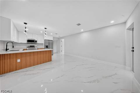 851 Calumet St E, Lehigh Acres FL - photo 11 of 36