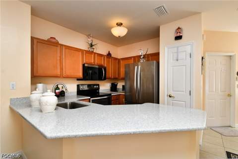 8676 Athena Ct, Lehigh Acres FL - photo 10 of 39