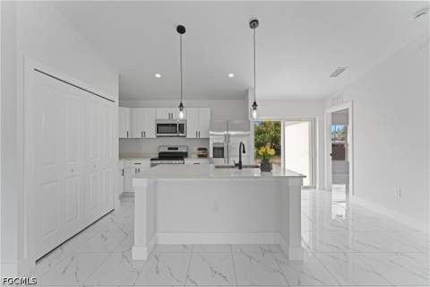 909 Grant Blvd, Lehigh Acres FL - photo 6 of 16