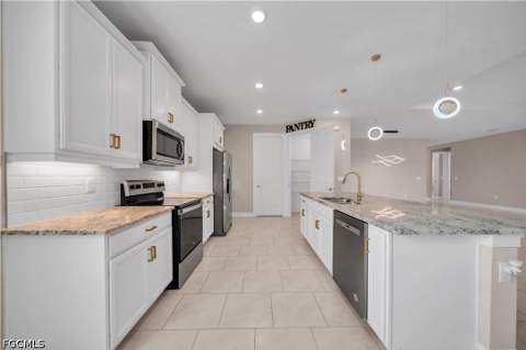 838 NW 2nd St, Cape Coral FL - photo 12 of 29