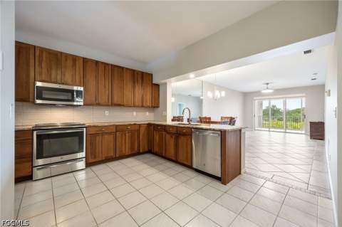 14211 Patty Berg Dr 202, Fort Myers FL - photo 7 of 38