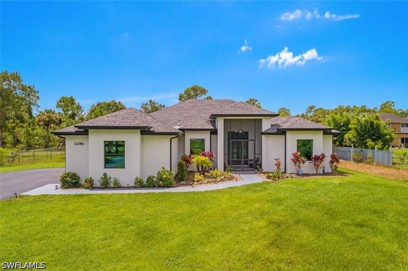 4 bedroom SingleFamilyResidence at 2286 2nd Ave SE, Golden Gate Estates, Naples — photo 2