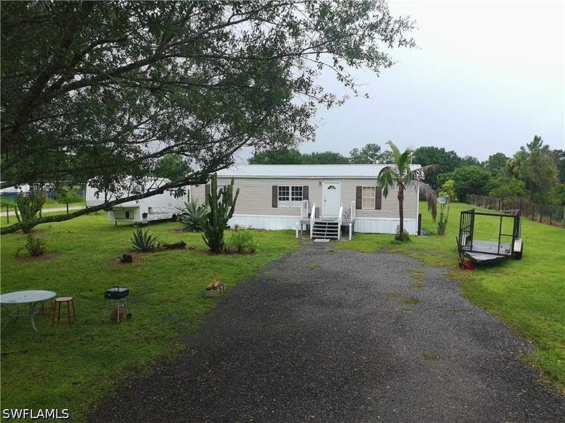 3 bedroom ManufacturedHome at 451 Bald Cypress Ave, Montura Ranch Estates, Clewiston — photo 3