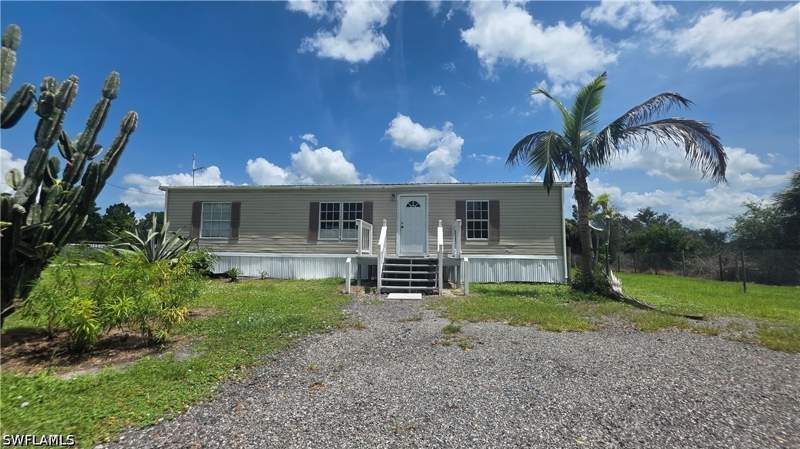 3 bedroom ManufacturedHome at 451 Bald Cypress Ave, Montura Ranch Estates, Clewiston — photo 4