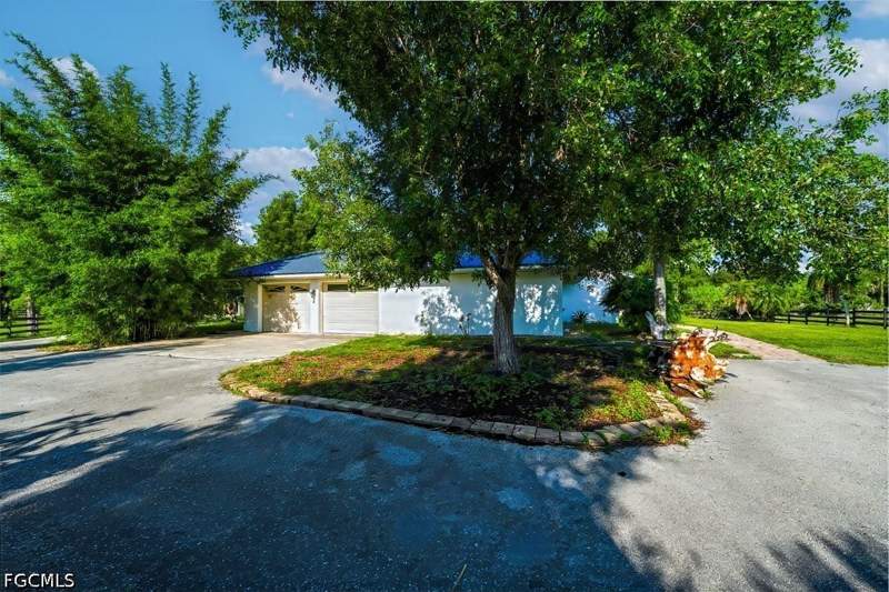 5 bedroom SingleFamilyResidence at 9200 Nalle Grade Rd, North Fort Myers, North Fort Myers — photo 5