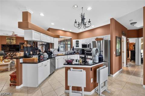 4914 SW 25th Ct, Cape Coral FL - photo 10 of 38