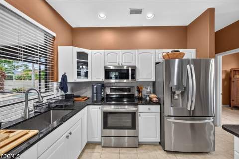 4914 SW 25th Ct, Cape Coral FL - photo 11 of 38