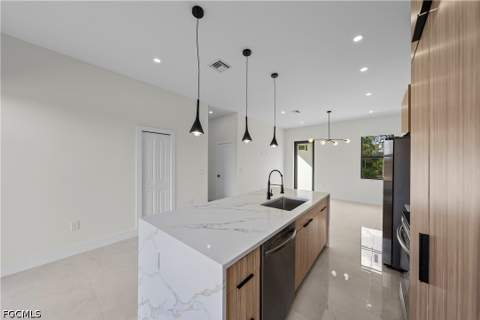 1023 Graystone Ave, Lehigh Acres FL - photo 8 of 25