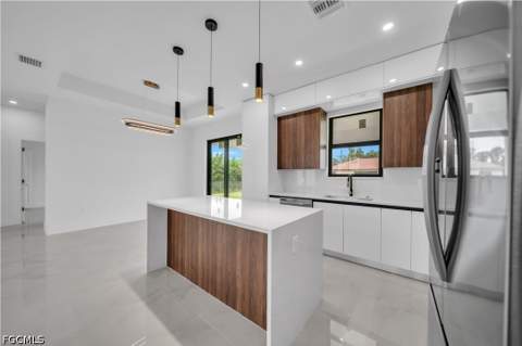 129 NW 14th St, Cape Coral FL - photo 7 of 38