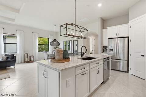 8877 Horned Lark Dr, Naples FL - photo 12 of 50