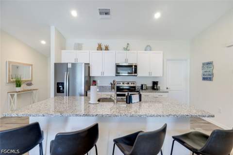 327 NW 23rd St, Cape Coral FL - photo 11 of 41