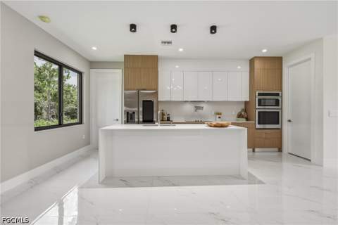 722 Roosevelt Ave, Lehigh Acres FL - photo 9 of 32