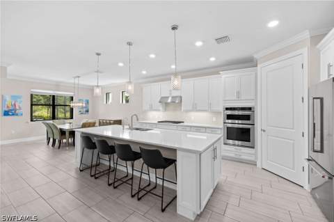 6907 Cocoplum St, Naples FL - photo 9 of 43