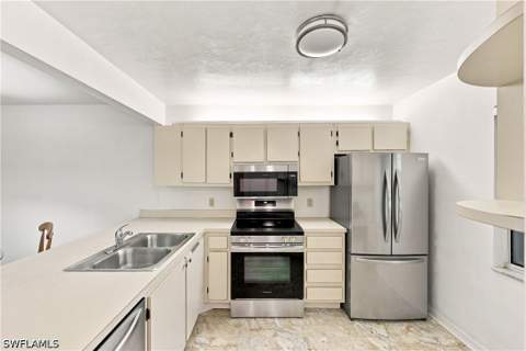 2612 Kings Lake Blvd 2-103, Naples FL - photo 8 of 26