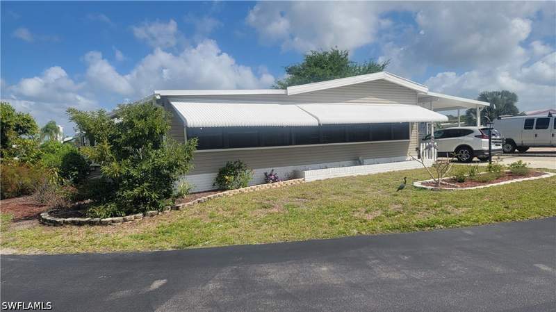 2 bedroom ManufacturedHome at 4712 Tahiti Dr, Spring Creek Village, Bonita Springs — photo 2