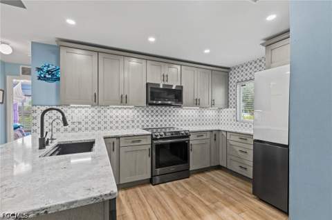 1208 NW 15th Pl, Cape Coral FL - photo 11 of 36