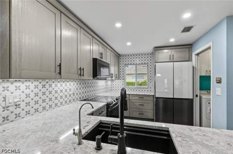 1208 NW 15th Pl, Cape Coral FL - photo 12 of 36