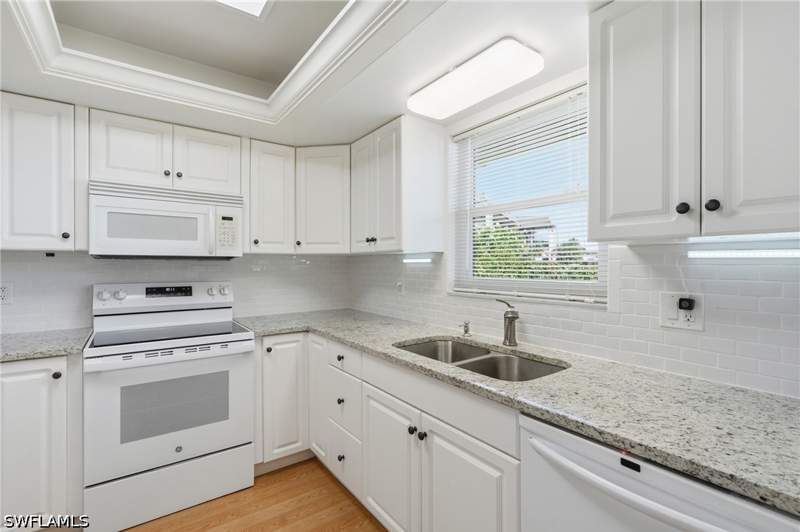 2 bedroom Condominium at 5435 Rattlesnake Hammock #E107, Country Club Manor, Naples — photo 2