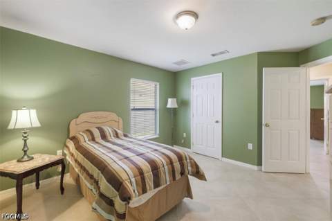 8141 Liriope Loop, Lehigh Acres FL - photo 13 of 17