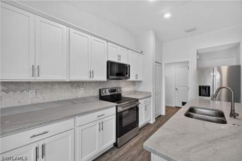 204 NW 28th Ter, Cape Coral FL - photo 6 of 21