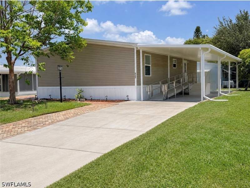 3 bedroom ManufacturedHome at 9325 Baron Rd, Imperial Harbor, Bonita Springs — photo 2