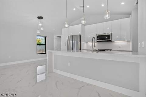 526 Wabasso Ave S, Lehigh Acres FL - photo 10 of 42
