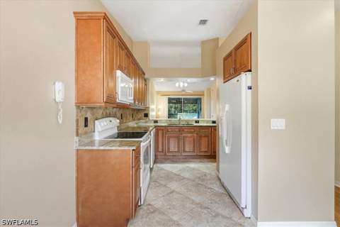 2526 Orchid Bay Dr 202, Naples FL - photo 8 of 32