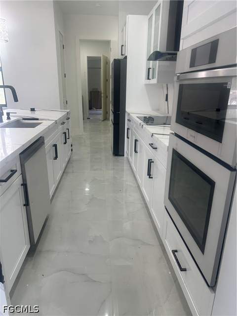 119 Moore Ave, Lehigh Acres FL - photo 11 of 47