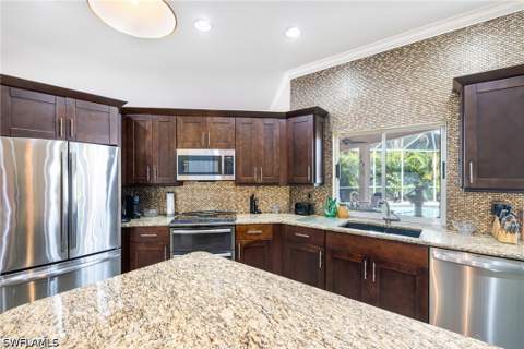 9311 Cedar Creek Dr, Bonita Springs FL - photo 7 of 46