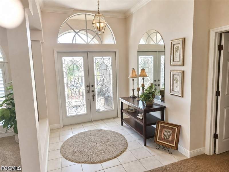 4 bedroom SingleFamilyResidence at 14820 Lake Olive Dr, The Grove, Fort Myers — photo 2