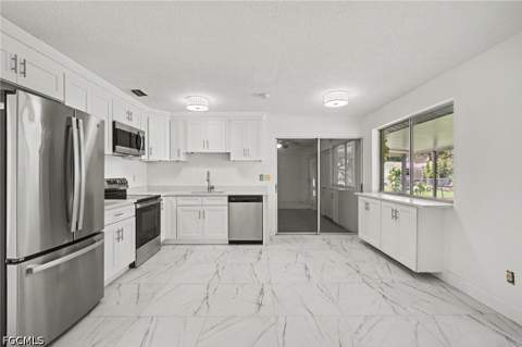638 NE 15th Ct, Cape Coral FL - photo 24 of 39