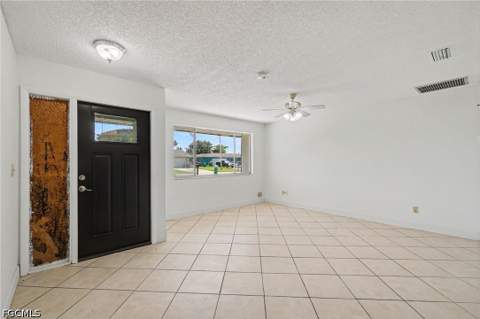 638 NE 15th Ct, Cape Coral FL - photo 6 of 39