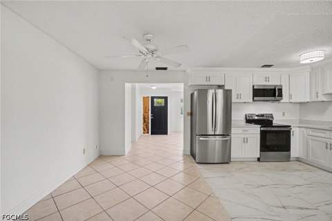 638 NE 15th Ct, Cape Coral FL - photo 7 of 39
