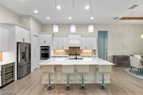 14338 Laguna Springs Ln, Naples FL - photo 9 of 40