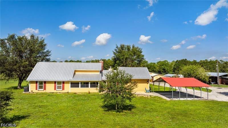 4 bedroom SingleFamilyResidence at 5500/5510 Pangola RD, ORANGE RIVER RANCHETTES, Fort Myers — photo 4