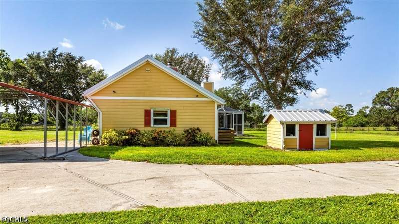 4 bedroom SingleFamilyResidence at 5500/5510 Pangola RD, ORANGE RIVER RANCHETTES, Fort Myers — photo 5