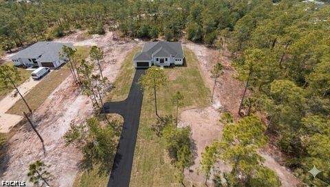 4 bedroom SingleFamilyResidence at 3168 56th Ave NE, Golden Gate Estates, Naples — photo 2