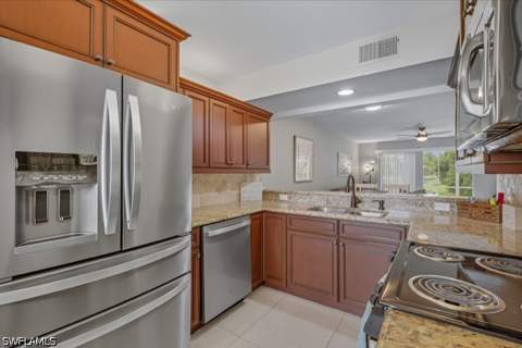 145 Robin Hood Cir 104, Naples FL - photo 8 of 34