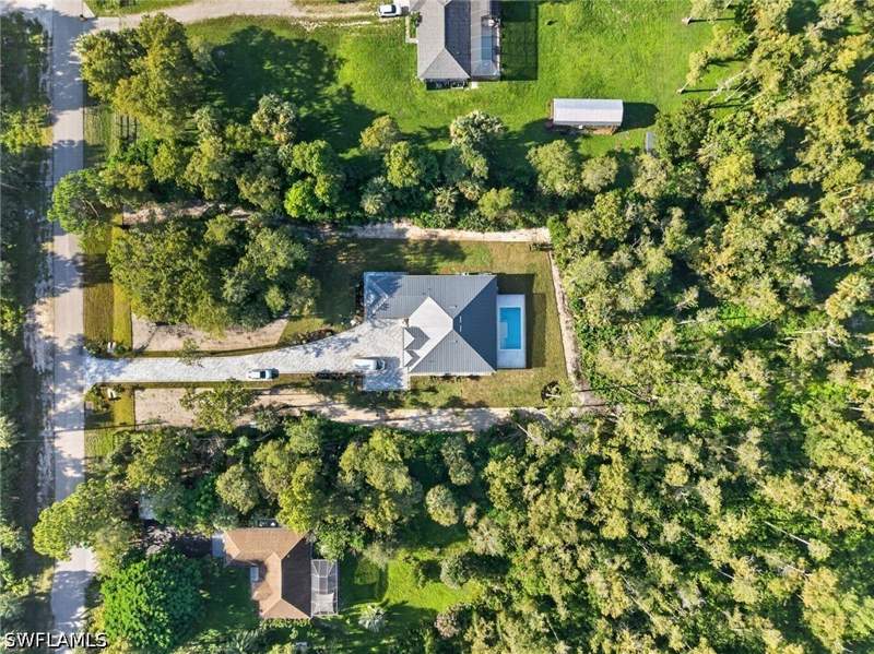 4 bedroom SingleFamilyResidence at 533 6th St SE, Golden Gate Estates, Naples — photo 4