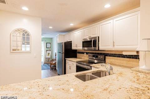 1310 Yesica Ann Cir H203, Naples FL - photo 7 of 38