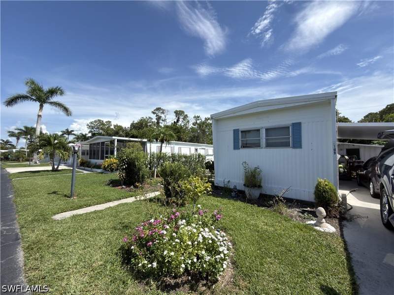 2 bedroom ManufacturedHome at 109 Enchanting Blvd, Enchanting Acres Mobile Home, Naples — photo 2
