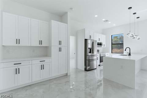 2913 24th St W, Lehigh Acres FL - photo 10 of 36