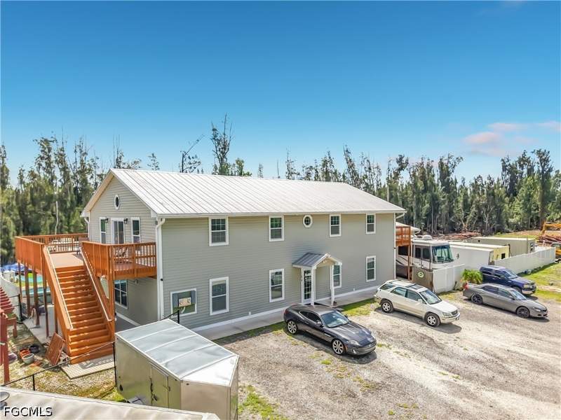 5 bedroom SingleFamilyResidence at 11870 Pompano Ave, Carriage Homes At Woods Edge, Cape Coral — photo 3