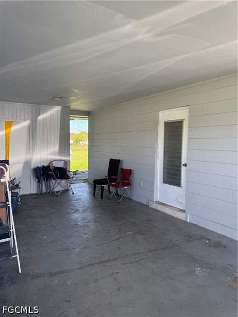 1109 E Jasmine Rd, Lehigh Acres FL - photo 10 of 57
