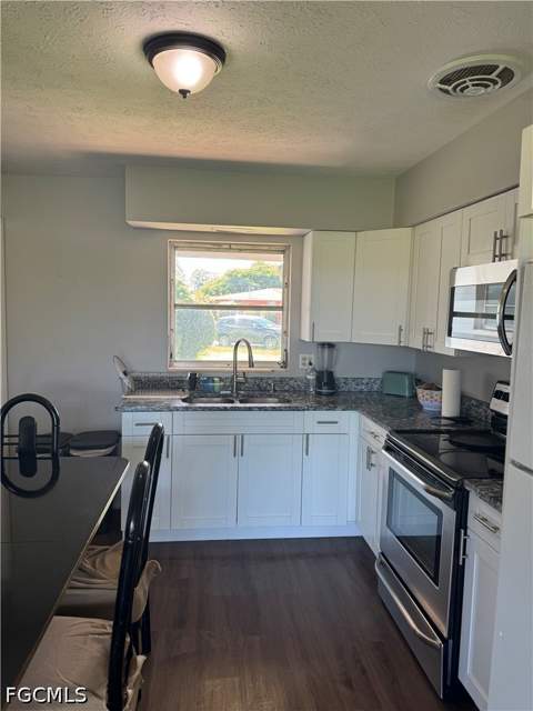 1109 E Jasmine Rd, Lehigh Acres FL - photo 23 of 57