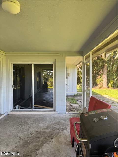 1109 E Jasmine Rd, Lehigh Acres FL - photo 7 of 57