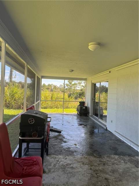 1109 E Jasmine Rd, Lehigh Acres FL - photo 8 of 57