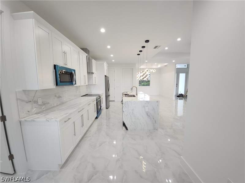 4 bedroom SingleFamilyResidence at 3983 33rd Ave NE, Golden Gate Estates, Naples — photo 3