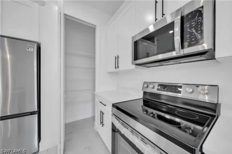 1003 Elgin St, Lehigh Acres FL - photo 14 of 42