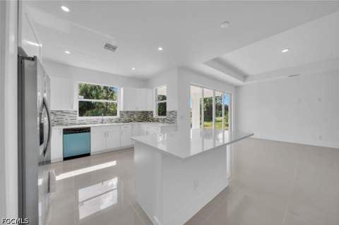 523 Harry Thayer Ave S, Lehigh Acres FL - photo 6 of 32